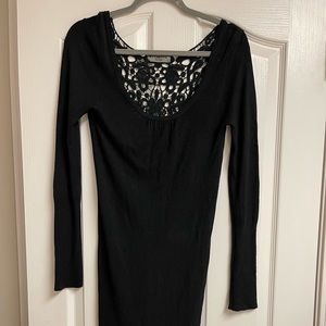 Sweater dress with crocheted back